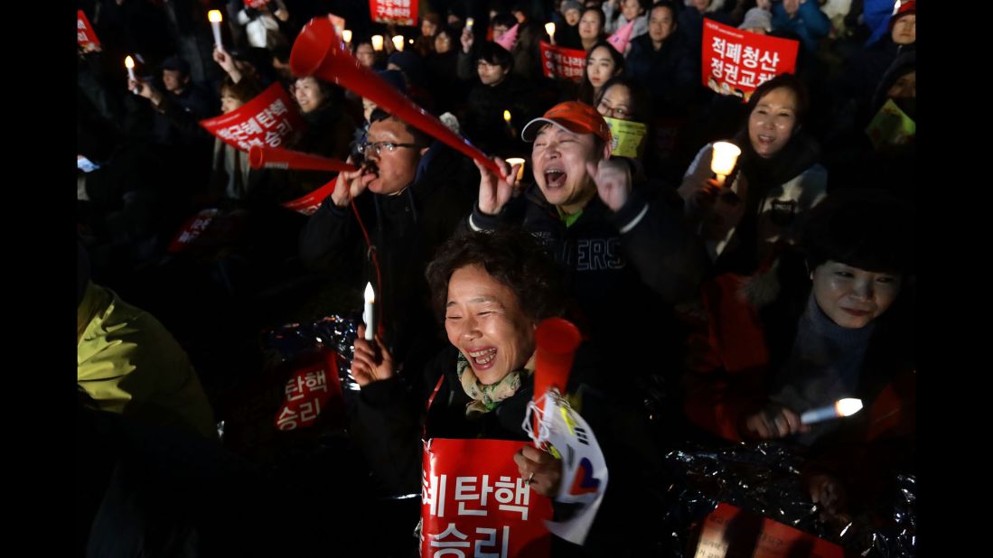 People celebrate after the Constitutional Court's verdict.