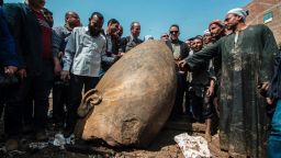 Egyptian minister of antiquates Khaled el-Anani poses for picture with workers next to the head of a statue at the site of a new discovery by a team of German-Egyptian archeologists in Cairo's Mattarya district on March 9, 2017.
Statues of the kings and queens of the nineteenth dynasty (1295 - 1185 BC) were unearthed in the vicinity of the Temple of Ramses II in what was the old Pharonic city.  / AFP PHOTO / KHALED DESOUKI        (Photo credit should read KHALED DESOUKI/AFP/Getty Images)