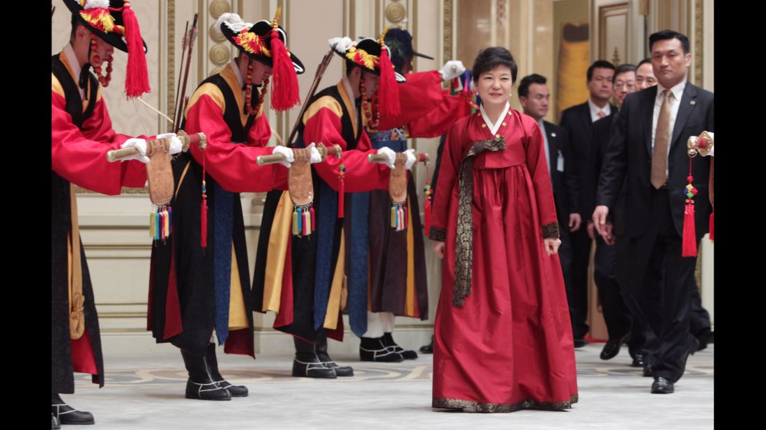 Park arrives for a dinner at the presidential Blue House following her inauguration in 2013.