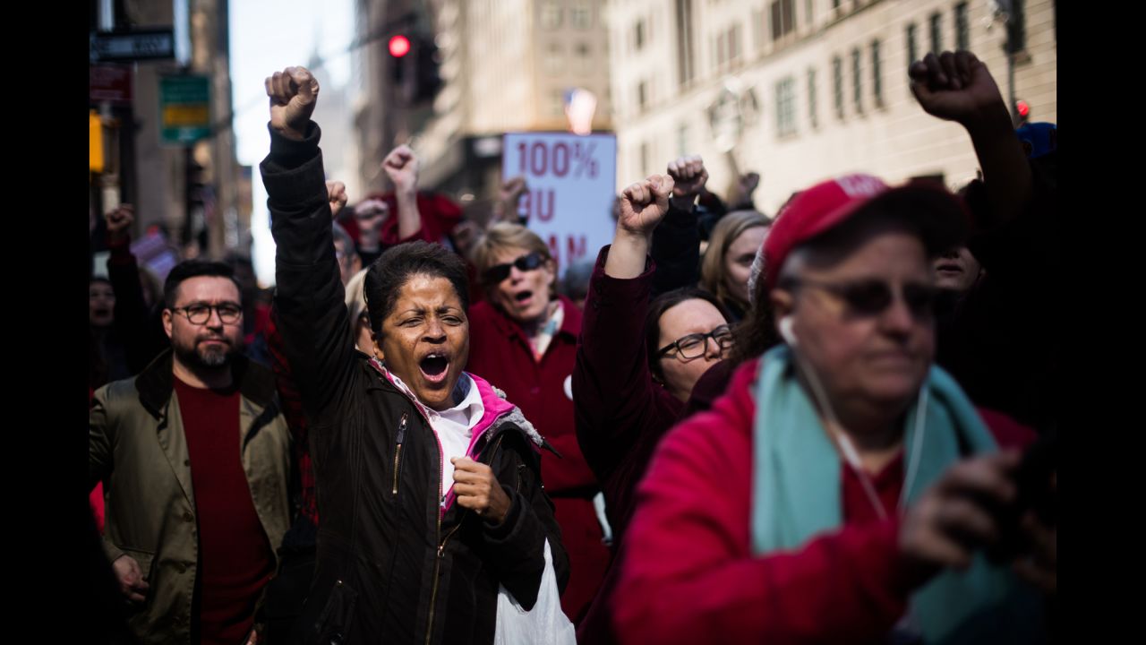 Gloria Brown cheers during a rally in New York for International Women's Day, which was celebrated on Wednesday, March 8. "I'm here because I'm a woman, but I'm also here because of the lack of equality that women face," she said. "I want to show that we do have power by supporting each other. We have to keep fighting for our rights." <a href="http://www.cnn.com/2017/03/08/us/womens-day-portraits-cnnphotos/index.html" target="_blank">Read more: International Women's Day, in their words</a>
