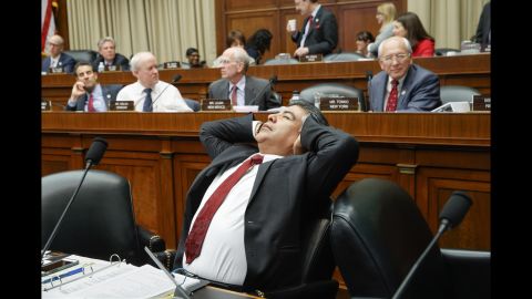After working through the night, US Rep. Tony Cardenas stretches Thursday, March 9, while members of the Energy and Commerce Committee argue the details of a health care bill introduced by top House Republicans.