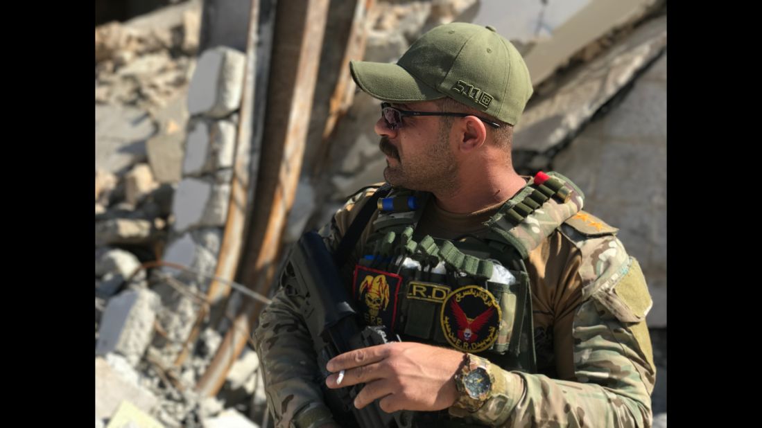 An Iraqi Rapid Response officer takes a break inside western Mosul's Dawasa neighborhood. Iraqi forces have made big advances inside western Mosul and liberated many of the neighborhoods there since launching an offensive to retake that part of the city last month. ISIS seized Mosul in June 2014.