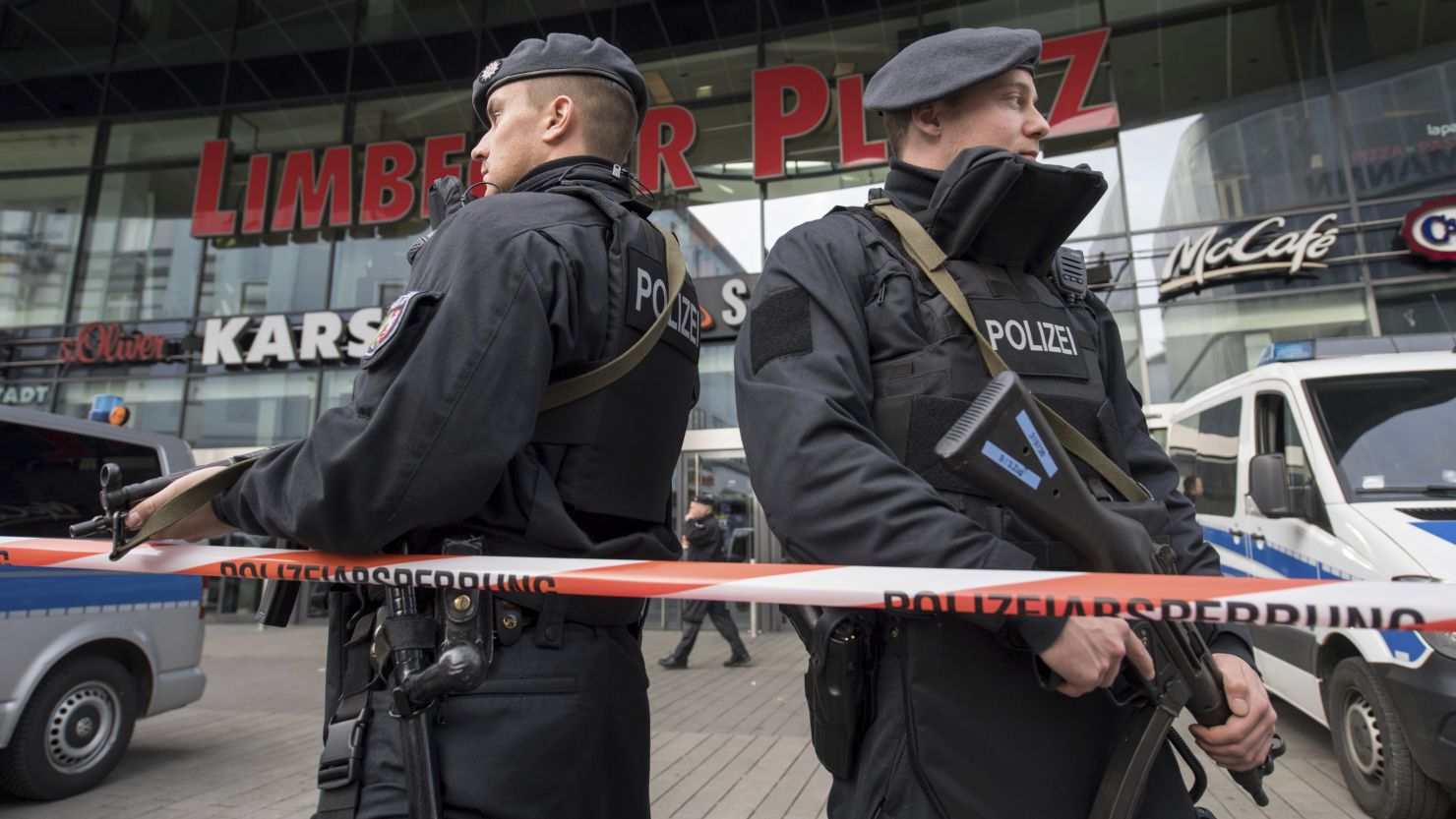 Police guard a shopping mall Saturday in Essen, Germany, amid a terror threat. 