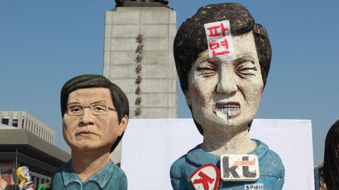 Sculptures depicting ousted South Korean President Park Geun-hye and acting President Hwang Kyo-ahn at a protest camp on Gwanghwamun Square.