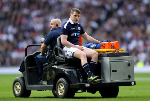 Nothing was going right for Scotland. Mark Bennett is pictured leaving the pitch injured.