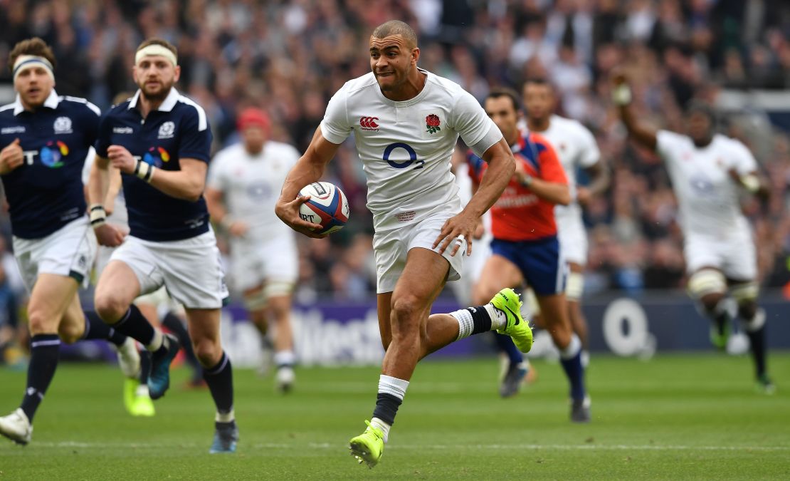 England's centre Jonathan Joseph runs to score his team's first try during the Six Nations international rugby union match between England and Scotland