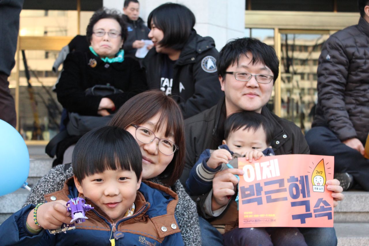 Lee Dong-sun, 36, brought her children to the demonstration celebrating Park's impeachment. "Before, when there were other protests, I would just sit at home, even when I agreed," she said. "But after I had children, I felt I could no longer ride on the backs of others ... to bring them the future I desire."