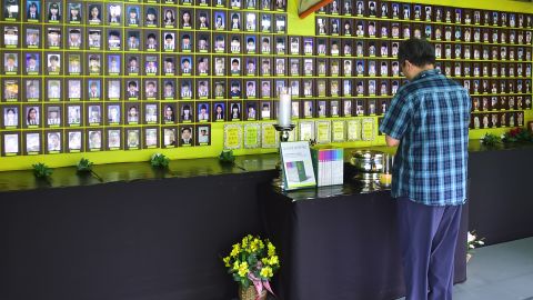 A man prays in front of portraits of the victims of South Korea's Sewol ferry disaster at a memorial altar in Seoul's Gwanghwamun Square.