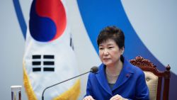 SEOUL, SOUTH KOREA - DECEMBER 09:  In this handout photo released by the South Korean Presidential Blue House, South Korea's President Park Geun-Hye attends the emergency cabinet meeting at the presidential office on December 9, 2016 in Seoul, South Korea. The South Korean National Assembly voted for an impeachment motion at its plenary session, which will set up the rare impeachment trial for President Park over the accusation of corruption involving Park and her long time confidante.  (Photo by South Korean Presidential Blue House via Getty Images)