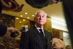 Conservative lobbyist and consultant Roger Stone speaks with the press in the lobby of Trump Tower in New York, New York, following a meeting there on December 6, 2016. 