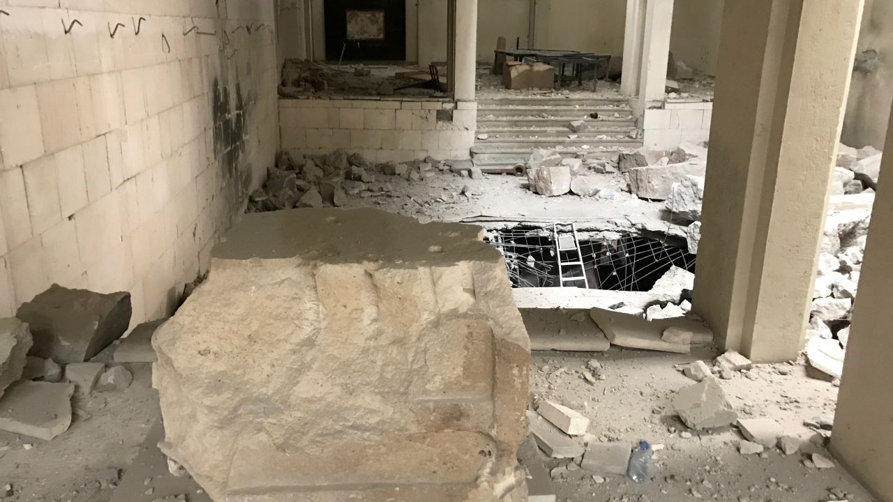 An empty stone pedestal in the middle of the Mosul museum. ISIS made a video of artifacts being destroyed with sledgehammers and jackhammers.