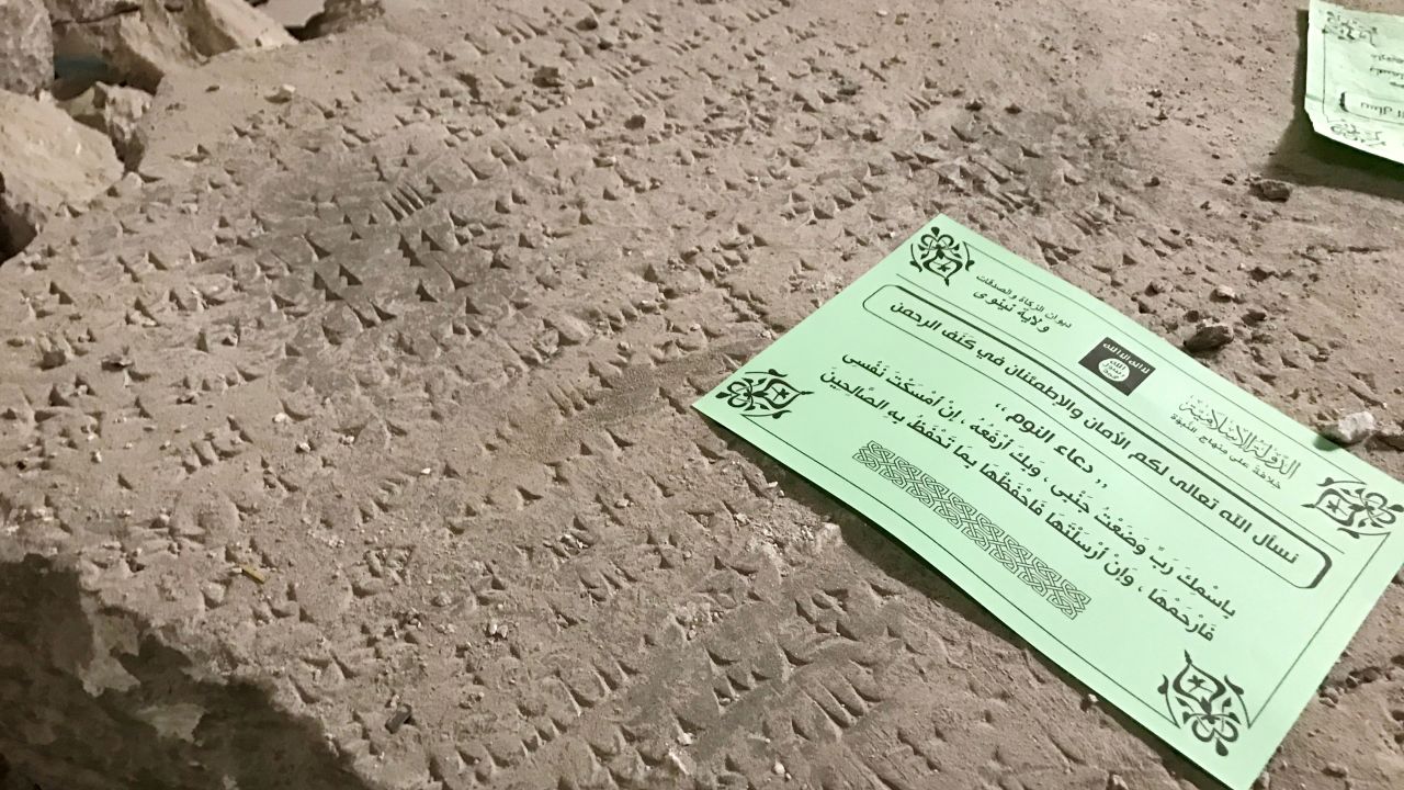 An ISIS leaflet left on an artifact's remains. The leaflet is a prayer for sleep.