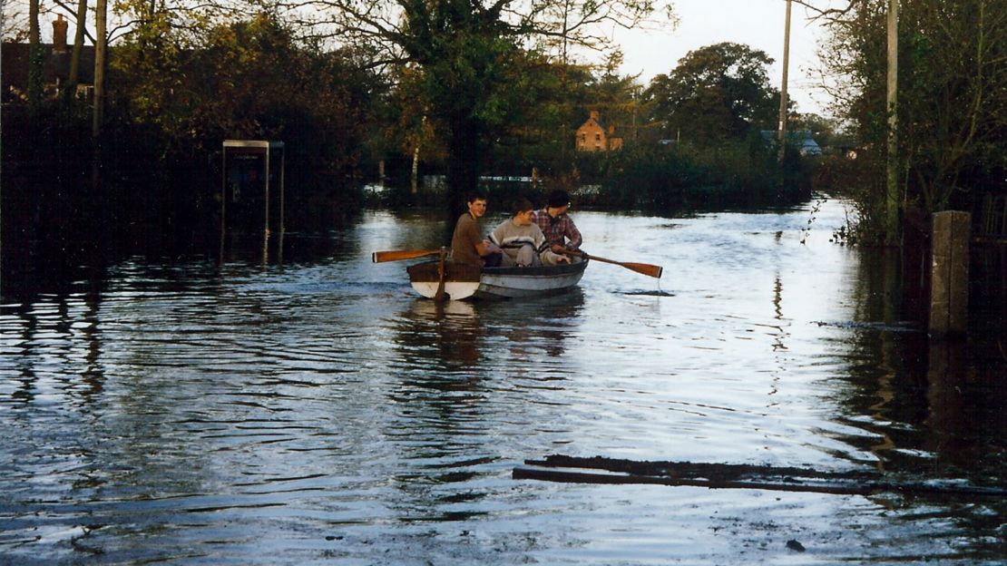 The Shepherd sons used a boat to get around the flooded village.