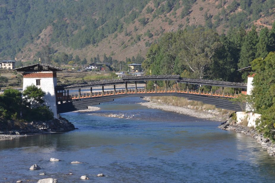 <strong>Punakha Valley: </strong>To reach the Punakha Dzong Monastery, visitors and monks alike cross a 300-year-old wooden bridge, spinning prayer wheels at both ends as mountain waters flow underneath.