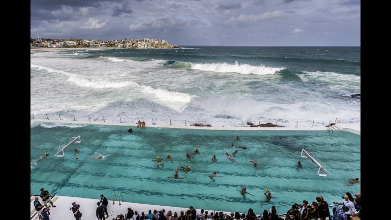 Australia's water polo team warms up for an exhibition match at Sydney's Bondi Beach on Thursday, March 9.