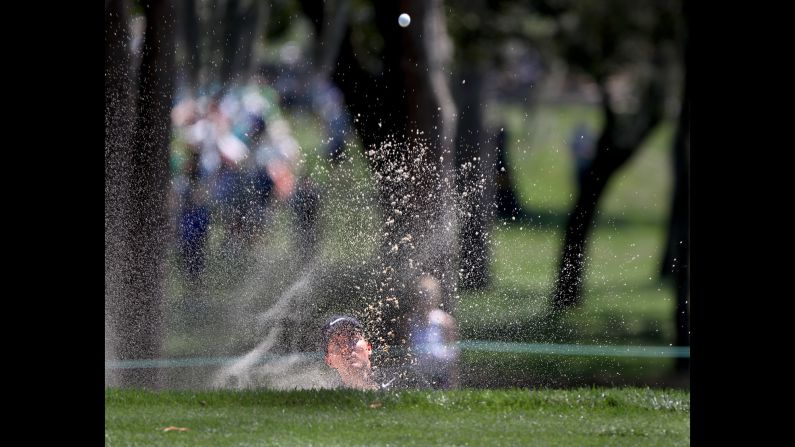 Russell Henley hits out of a sand trap during the first round of the Valspar Championship, a PGA Tour event in Palm Harbor, Florida, on Thursday, March 9.
