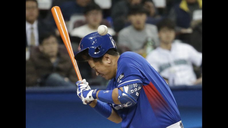 South Korea's Dae-ho Lee is hit by a pitch during a home game against Chinese Taipei on Thursday, March 9. South Korea won 11-8, its only victory in this year's World Baseball Classic.