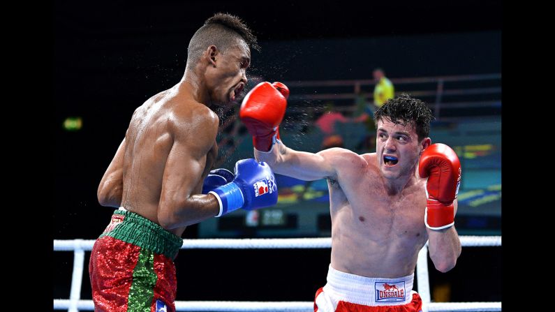Conor Loftus punches Youness Baati during a World Series of Boxing event in London on Wednesday, March 8. Loftus and the British Lionhearts won all five of their bouts against the Morocco Atlas Lions.