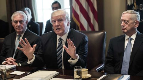 President Donald Trump speaks to the press with Secretary of State Rex Tillerson and Defense Secretary James Mattis at the White House on March 13, 2017.