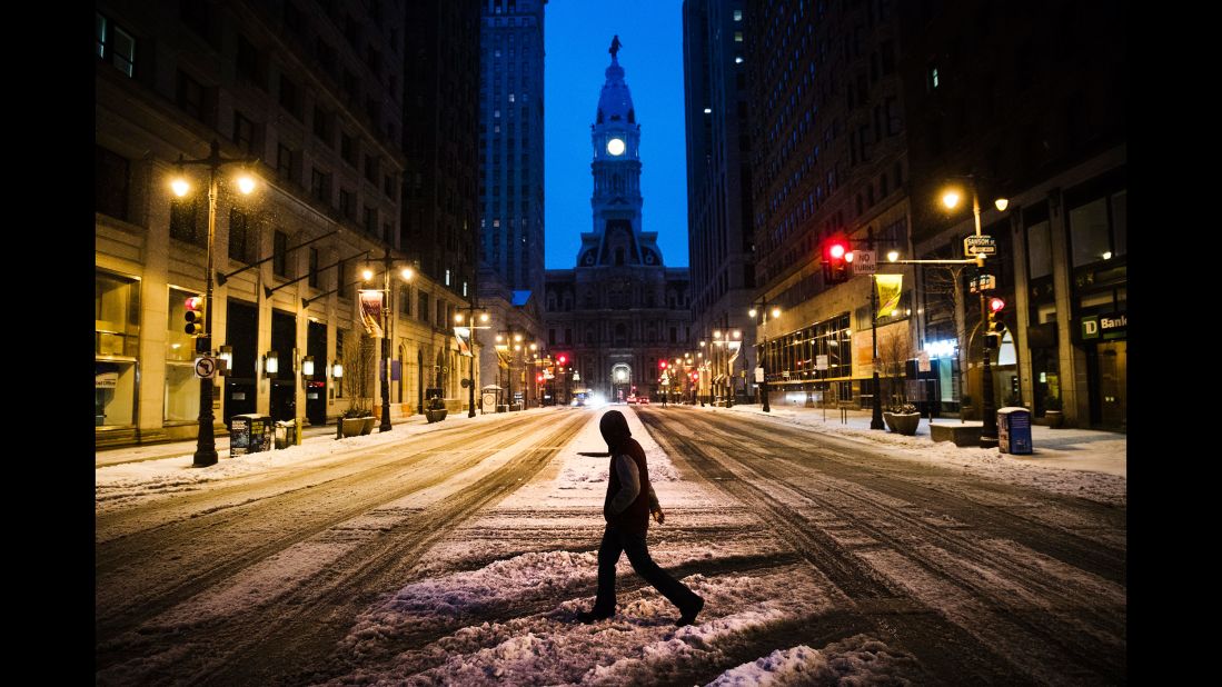 A man crosses South Broad Street in Philadelphia on March 14.