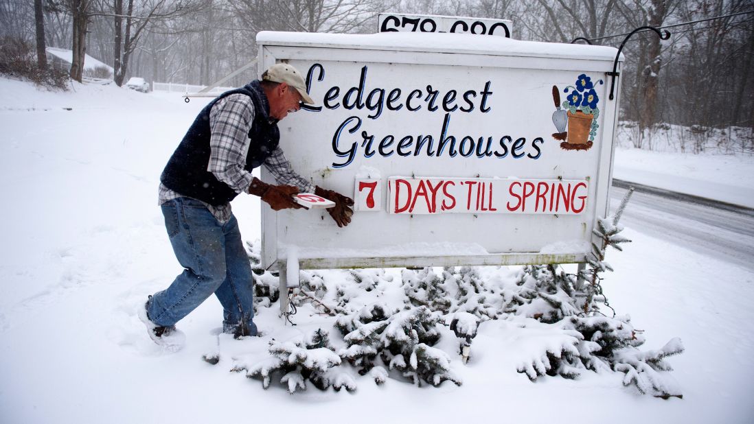Paul Hammer updates the sign in front of his nursery in Mansfield, Connecticut, on Tuesday, March 14.