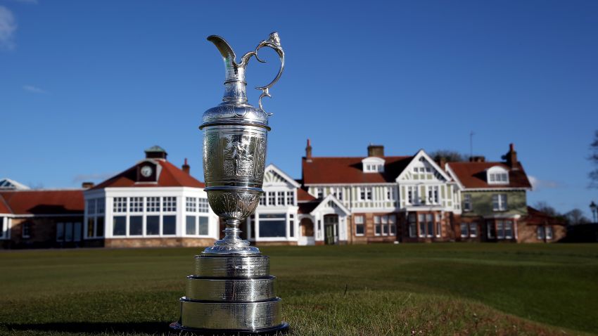 The Claret Jug trophy beside the 18th green in front of Muirfield's clubhouse