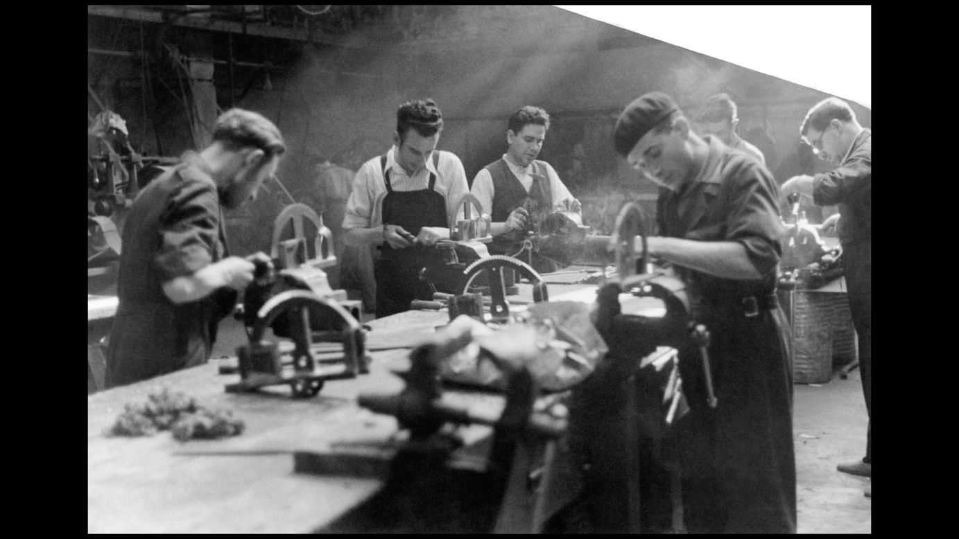 Men work in a munitions factory in Madrid in June 1937. The Spanish Civil War lasted nearly three years, with about half a million people killed before Franco's forces prevailed.