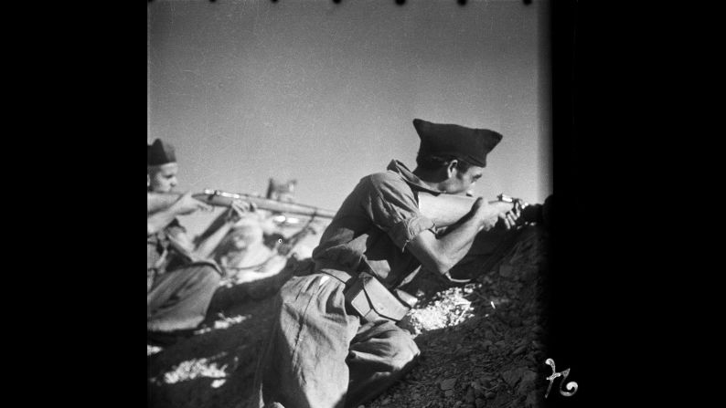 Republican militiamen fire weapons on the Cordoba front in September 1936. "Taro, like Capa, had a reputation for getting close to the action," <a  target="_blank">writer Jane Rogoyska told CNN in 2014.</a> "They both had a policy of really trying to engage with what it was like to experience war -- whether it was civilians or the front line. That was quite a modern idea, so they were really quite striking pictures."