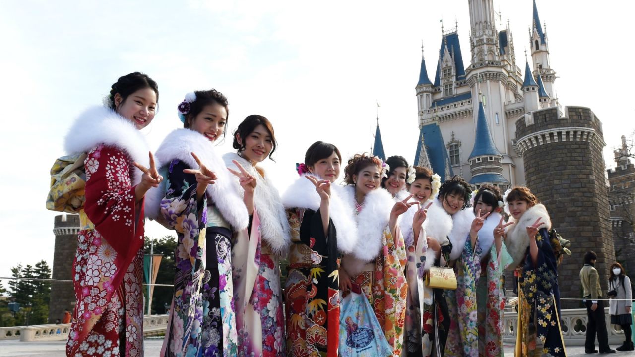 The magic blingdom: a Tokyo coming-out party puts on its best kimonos at Tokyo Disneyland.