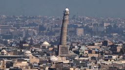 A general view shows the leaning minaret of the Great Mosque of al-Nuri in Mosul, on March 10, 2017, as Iraqi forces shell enemy positions during an offensive to retake the western parts of the city from the jihadists.