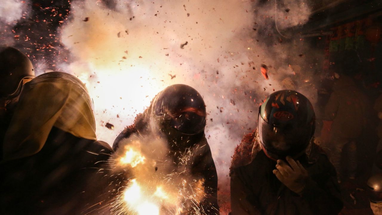 <strong>Yanshui Beehive Fireworks Festival, Taiwan --</strong> Travelers will want to don headgear -- or at least a hood -- if heading to Taiwan for the Yanshui Beehive Fireworks Festival. Each February, this popular festival sees 600,000 mini skyrockets splutter to life like angry bees before hurtling into the crowd. 