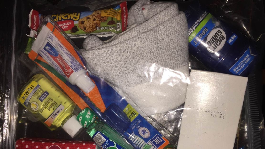 Each care package included daily essentials for the homeless including a toothbrush, toothpaste, hand sanitizer, and a protein bar.  