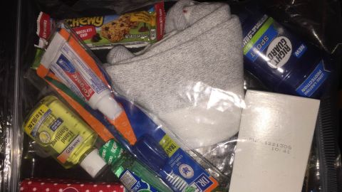 Each care package included daily essentials for the homeless including a toothbrush, toothpaste, hand sanitizer, and a protein bar.