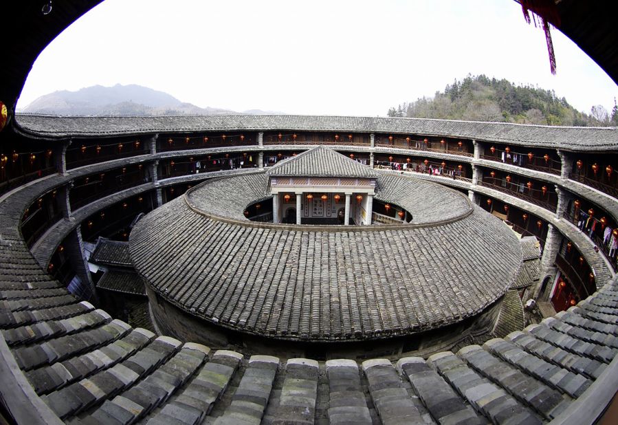 Lin Lusheng runs education projects in Fujian province to teach schoolchildren about the cultural history of tulous.<br />