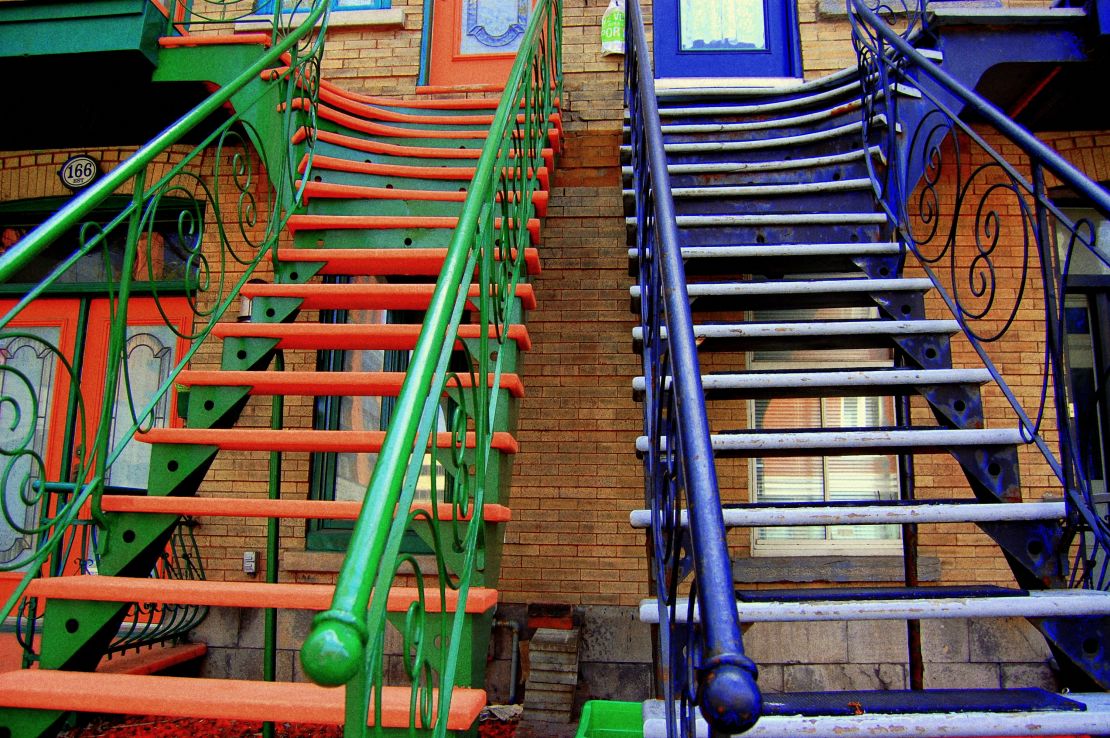 Le Plateau is known for row houses with colorful facades and wrought-iron staircases.