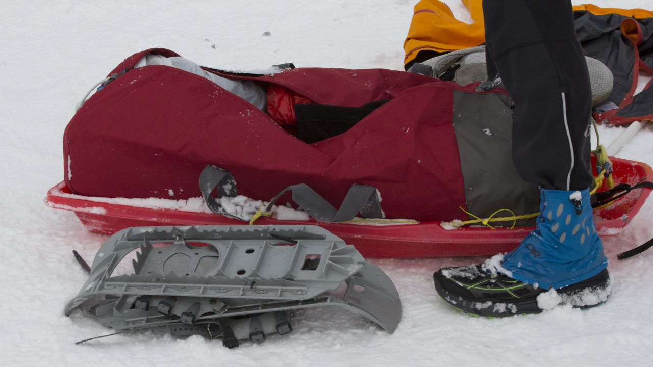 Most runners pull a minimum of 15 pounds of required gear behind them in a sled. The mandatory gear includes a sleeping bag rated minus-20 degrees Fahrenheit, a bivy sack or tent, sleeping pad, and a day's worth of food. 