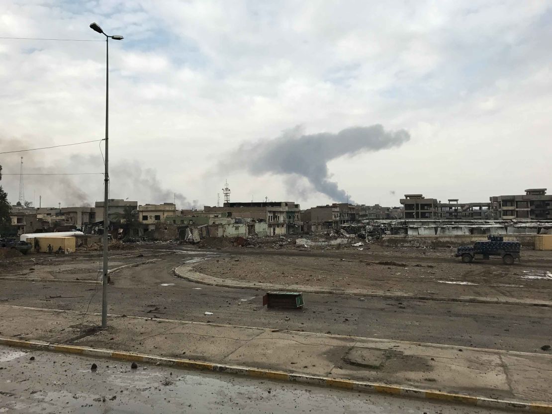 Smoke rises over west Mosul's old city. Iraqi forces are fighting street-by-street, house-by-house. The Iraqi government doesn't publish casualty figures but the CNN crew saw many ambulances rushing toward the battle zone.