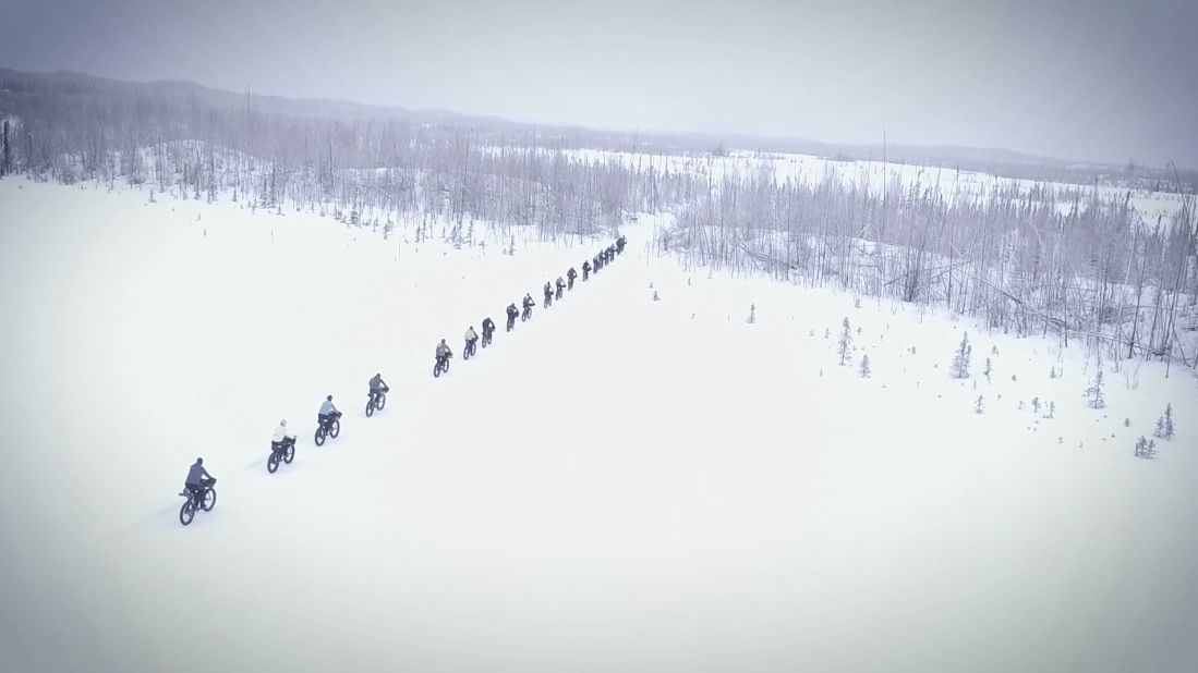 Racers begin down an icy road that turns into a trail that becomes wilderness within the first mile. Soon after that, the pack starts to thin out as bikers pull ahead.<br />