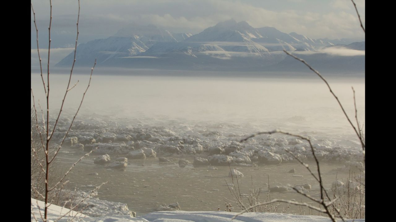 The race course winds through small frozen lakes, rivers, bogs and woods in the shadow of the Chugach Mountains.