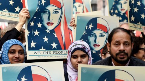 Protesters march in New York's Times Square in solidarity with American Muslims and against the travel ban ordered by US President Donald Trump on February 19, 2017. / TIMOTHY A. CLARY/AFP/Getty Images