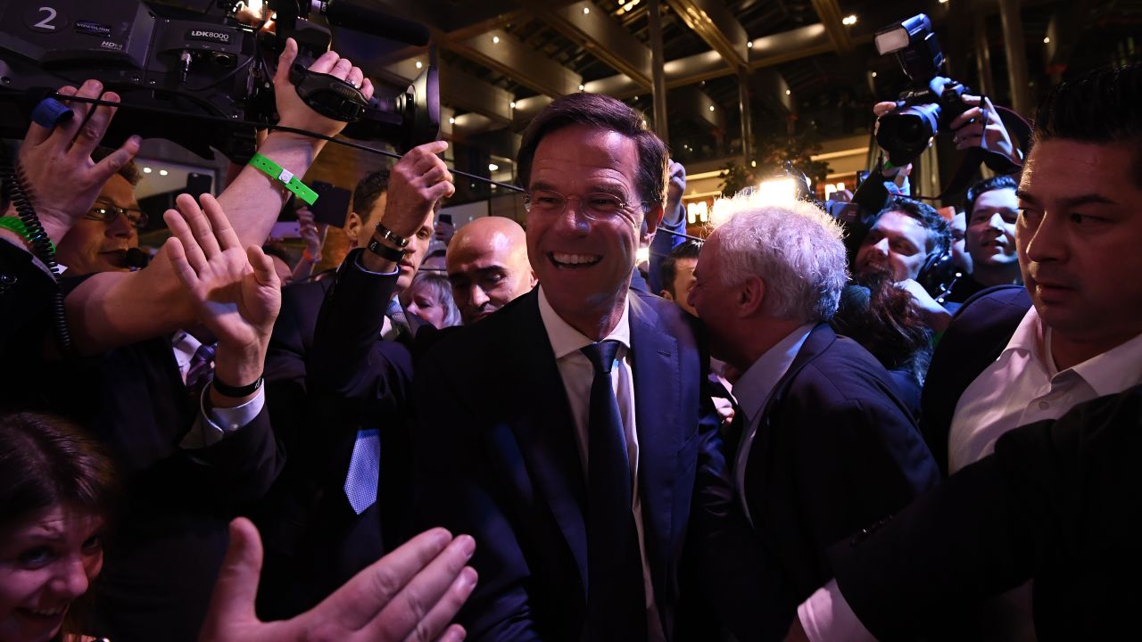 THE HAGUE, NETHERLANDS - MARCH 15: Dutch Prime Minister Mark Rutte is greeted by supporters as he arrives to make a speech following his victory in the Dutch general election on March 15, 2017 in The Hague, Netherlands. Dutch voters have gone to the polls in one of the most tightly contested general elections in recent years. (Photo by Carl Court/Getty Images)