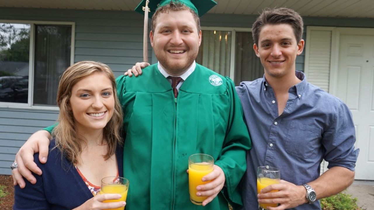 <strong>Graduation in green: </strong>C'mon guys! You were celebrating with orange juice. How did you manage to lose the photo?