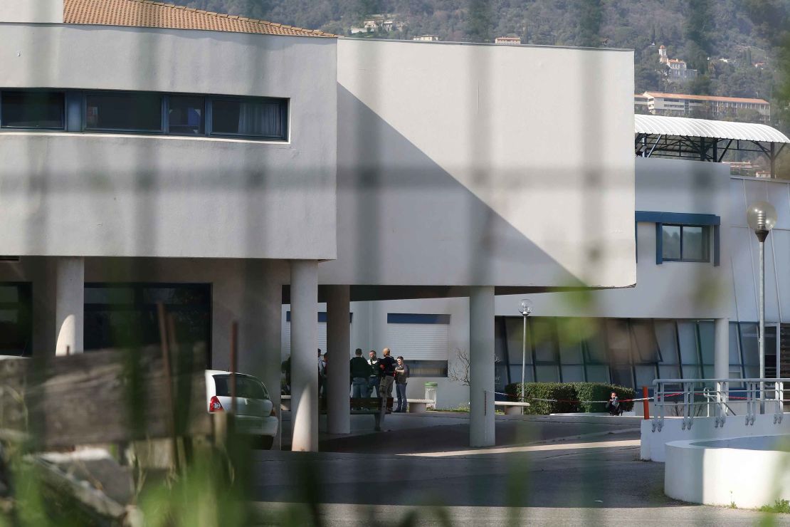 French policemen stand by the  Alexis de Tocqueville high school in the French town of Grasse.