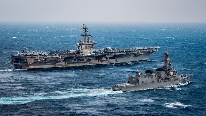 170309-N-BL637-513
EAST CHINA SEA (March 9, 2017) The aircraft carrier USS Carl Vinson (CVN 70), background, transits the East China Sea with the Japan Maritime Self-Defense Force Murasame-class destroyer JS Samidare (DD 106). The Carl Vinson Carrier Strike Group is on a western Pacific deployment as part of the U.S. Pacific Fleet-led initiative to extend the command and control functions of U.S. 3rd Fleet. (U.S. Navy photo by Mass Communication Specialist 2nd Class Sean M. Castellano/Released)