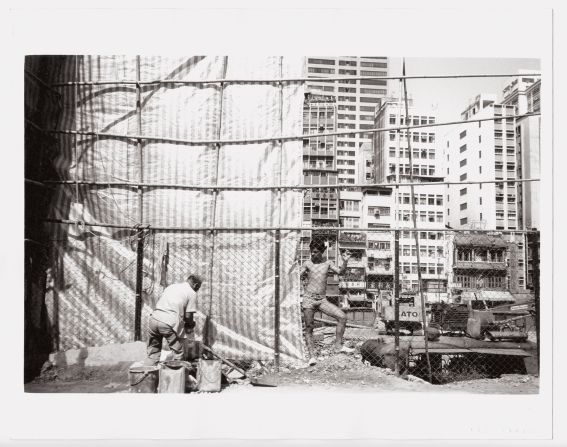 Construction work in Hong Kong.   Warhol's personal collection of photos from the trip may fetch up to $1.1 million in total by Phillips auction house. 