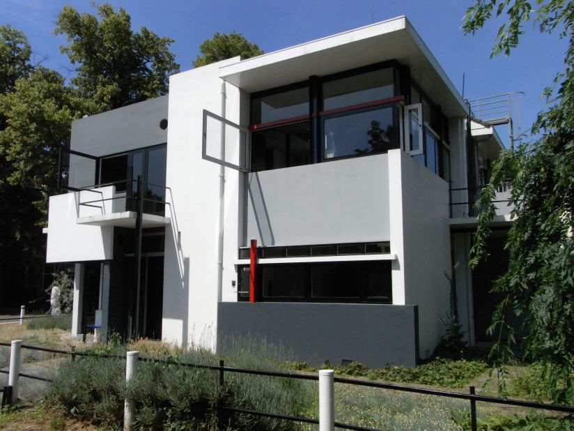 A constructed, three-dimensional Neo-plastic painting, this house is tiny in scale, but has been published in many architecture books around the world. Gerrit Rietveld pioneered the idea that Neo-Plasticism (coined by Piet Mondrian to describe his paintings of primary-colored grid lines on white canvas) could be extrapolated into architectural plans and built spaces.