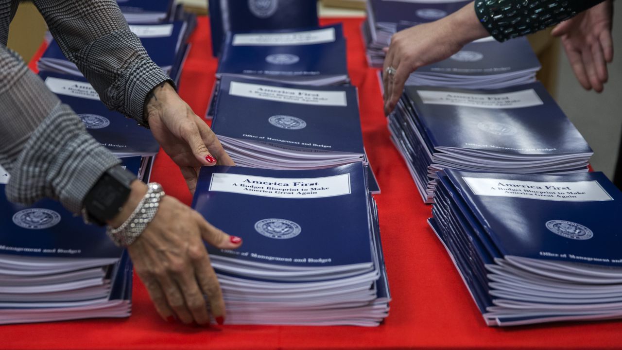 Copies of "America First," <a href="http://www.cnn.com/2017/03/16/politics/donald-trump-budget-blueprint/" target="_blank">President Donald Trump's budget proposal,</a> are arranged in Washington on Thursday, March 16. The outline calls for a $54 billion increase in defense spending, and it slashes funding to agencies such as the State Department and the Environmental Protection Agency. <a href="http://www.cnn.com/2017/03/16/politics/trump-budget-cuts/" target="_blank">Here's what Trump's budget proposes to cut</a>