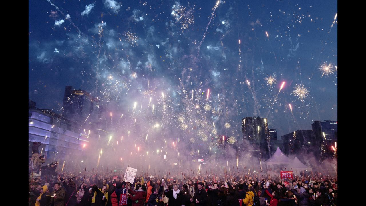People in Seoul, South Korea, celebrate with fireworks after the country's Constitutional Court upheld the impeachment of President Park Geun-hye on Friday, March 10. Demonstrators both for and against Park <a href="http://www.cnn.com/2017/03/10/asia/gallery/park-impeachement-south-korea/index.html" target="_blank">took to the streets</a> after the verdict. <a href="http://www.cnn.com/2017/03/09/world/gallery/week-in-photos-0310/index.html" target="_blank">See last week in 31 photos</a>
