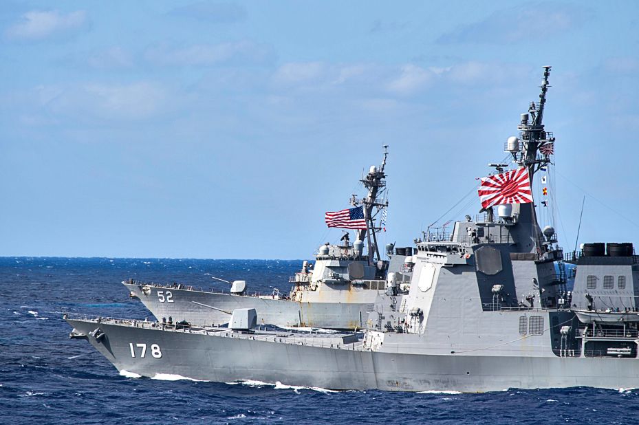 Japan Maritime Self-Defense Force guided-missile destroyer JS Ashigara, front, and the US Arleigh Burke-class guided-missile destroyer USS Barry patrol in the Philippine Sea. The US alliance is a key to Japan military strength.