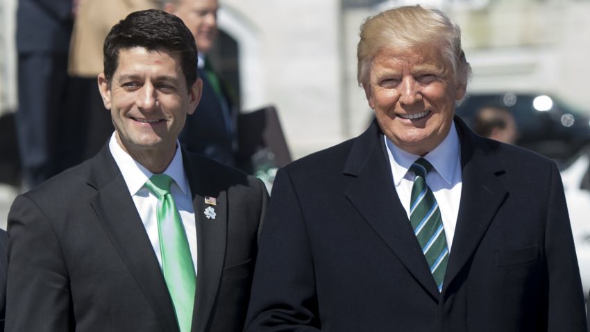 US President Donald Trump waves alongside Speaker of the House Paul Ryan (L) as Trump leaves the Friends of Ireland Luncheon for the visit of Taoiseach of Ireland Enda Kenny at the US Capitol in Washington, DC, March 16, 2017. / AFP PHOTO / SAUL LOEB        (Photo credit should read SAUL LOEB/AFP/Getty Images)